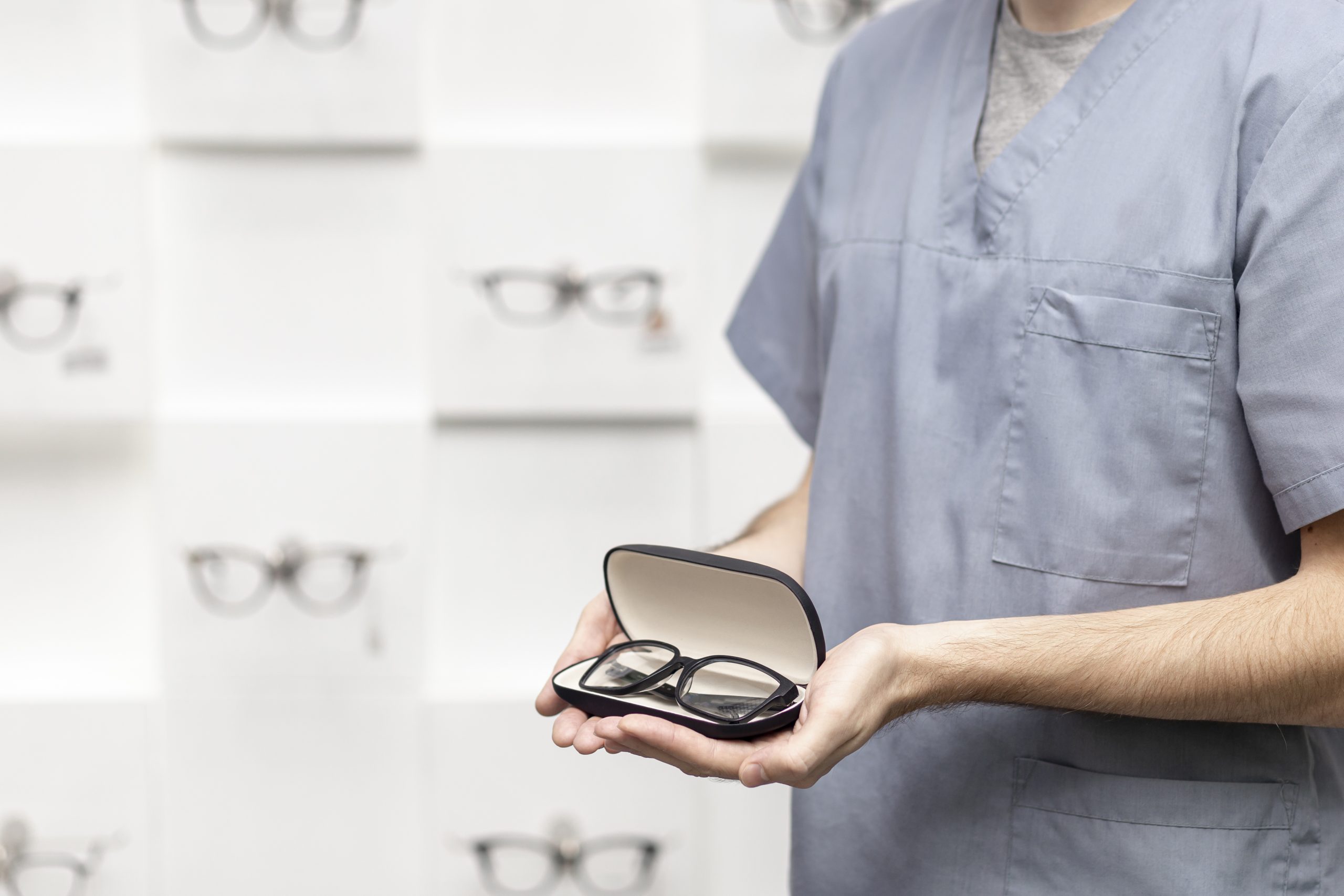 side-view-view-man-holding-pair-glasses-case